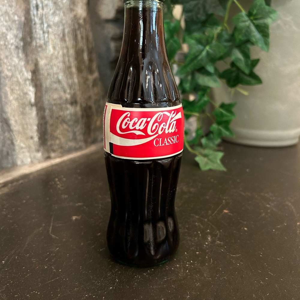 Coca Cola glass bottle filled